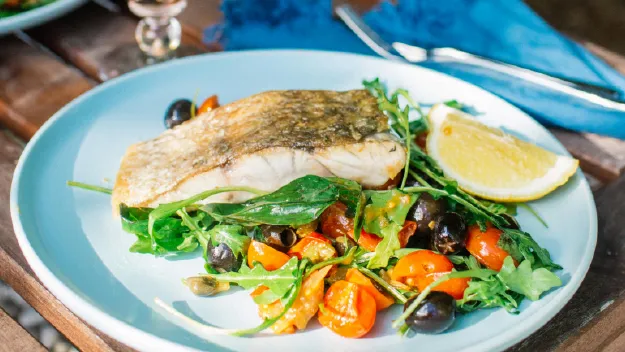 WARM BARRAMUNDI SALAD WITH TOMATOES, CAPERS AND OLIVES